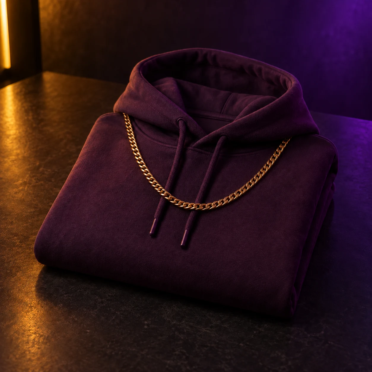 Deep plum hoodie with a gold chain product concept